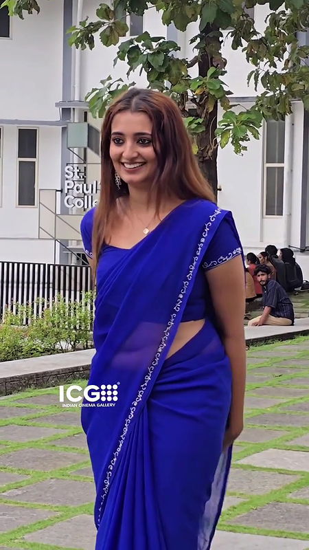 angel thomas sexy wide belly and deep navel hole in transaparent violet saree 2