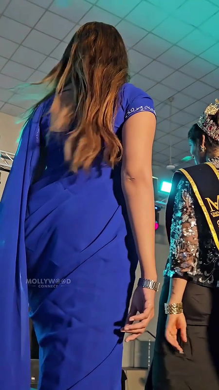 angel thomas sexy wide belly and deep navel hole in transaparent violet saree 2