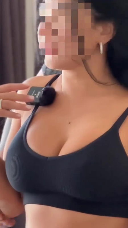 guy pressing dei lady breast in black sports bra 2