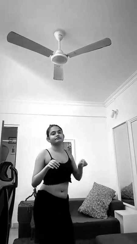 malayali actress sexy pierced navel and boobs in black costume 2