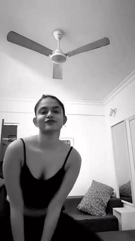 malayali actress sexy pierced navel and boobs in black costume 2