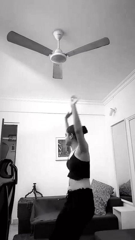 malayali actress sexy pierced navel and boobs in black costume 2