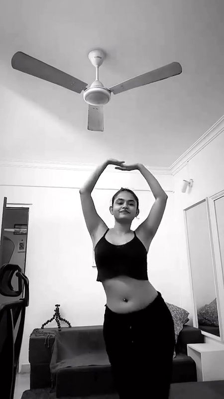 malayali actress sexy pierced navel and boobs in black costume 2