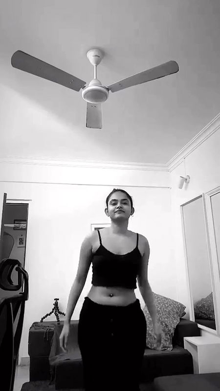 malayali actress sexy pierced navel and boobs in black costume 2