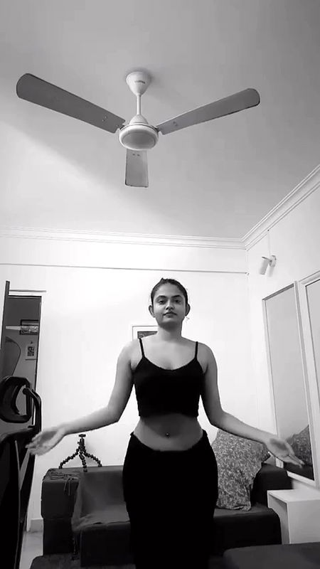 malayali actress sexy pierced navel and boobs in black costume 2