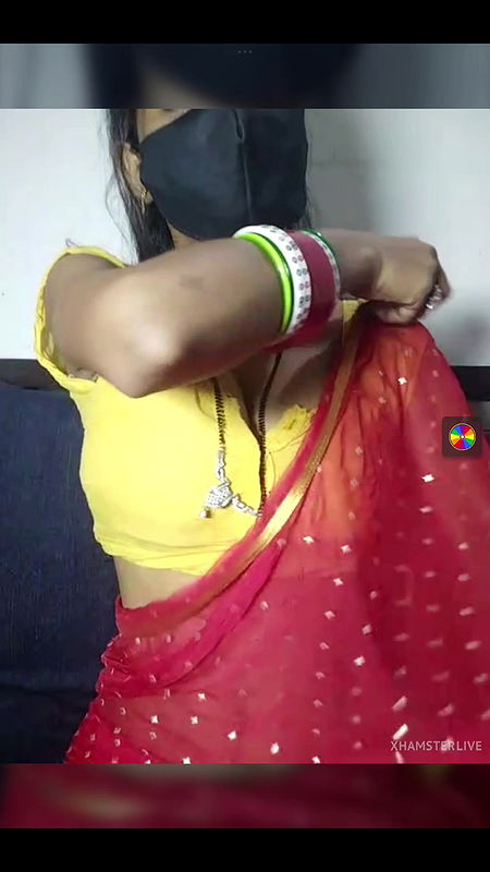 Slim Indian Desi cam model showing her body2