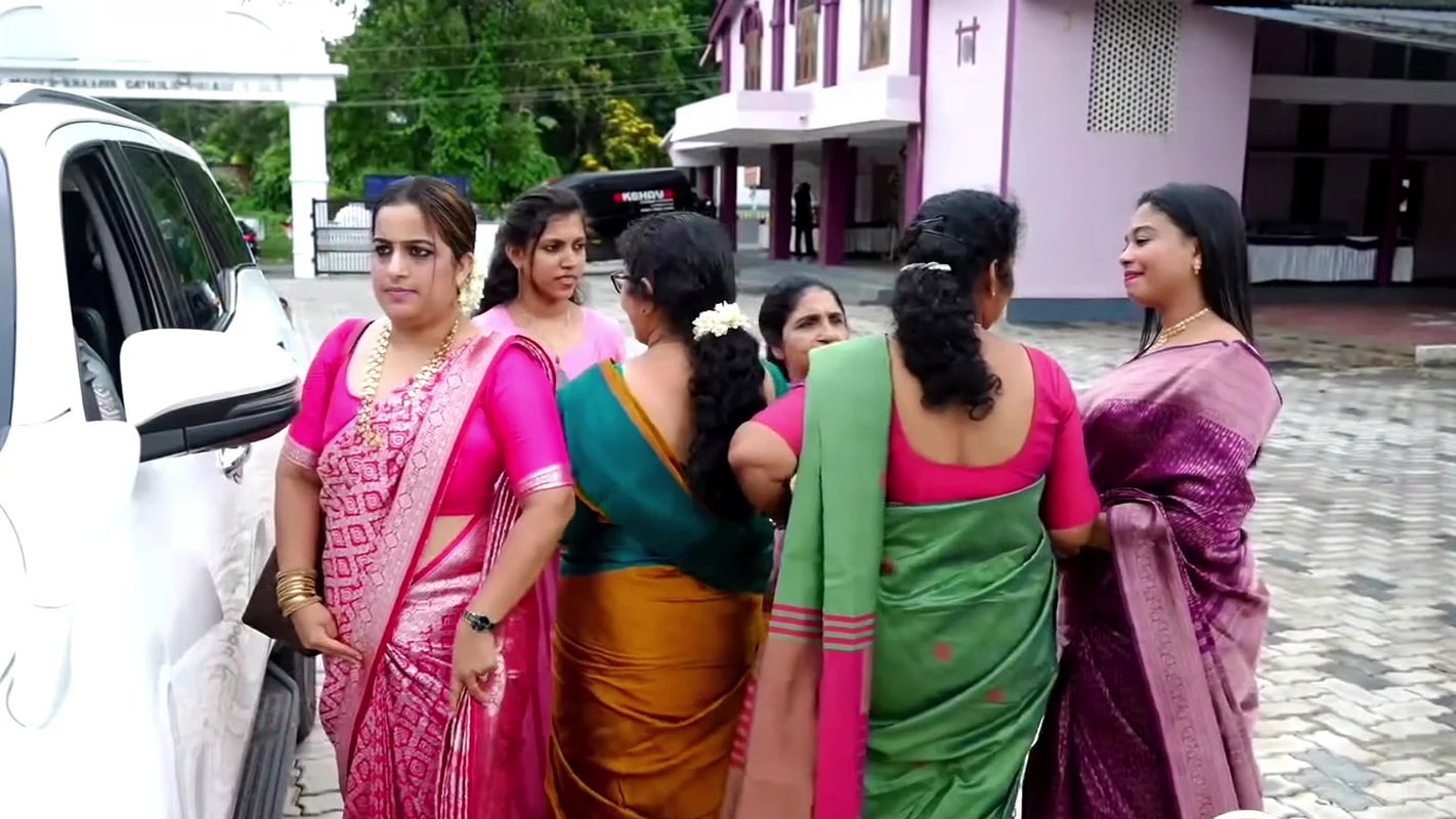 busty Malayali lady in white and violet kerala costume 2