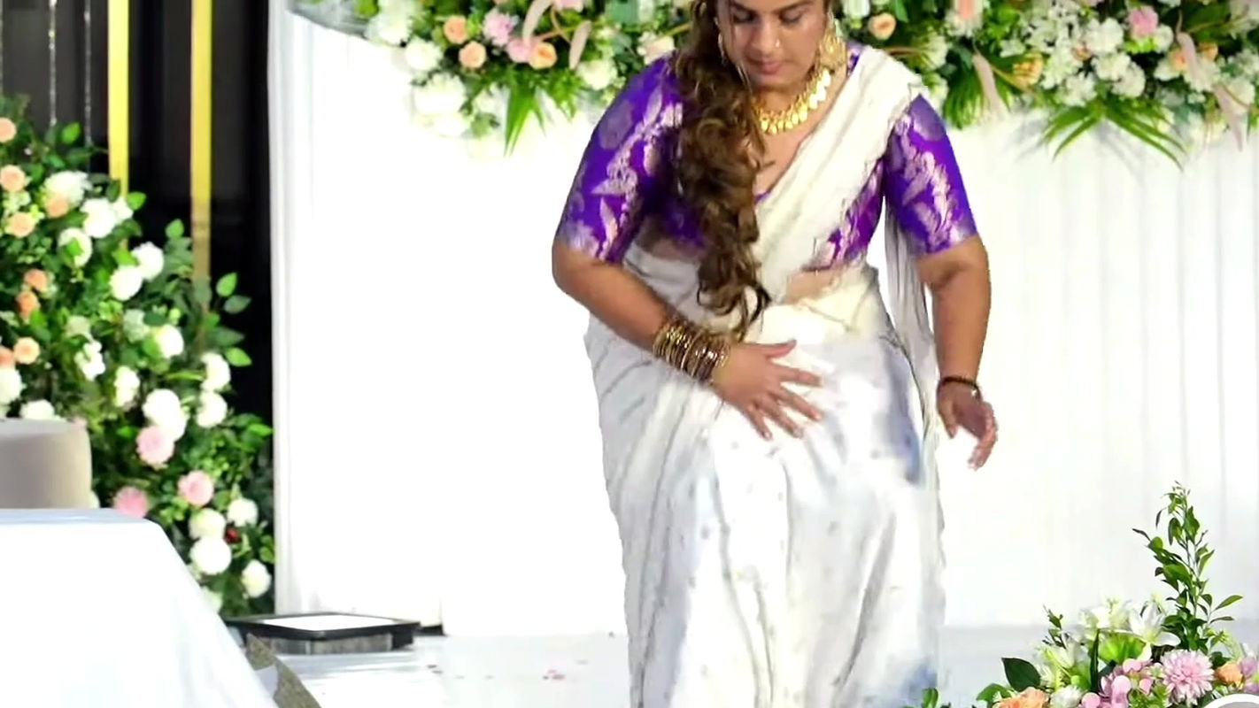 busty Malayali lady in white and violet kerala costume 2