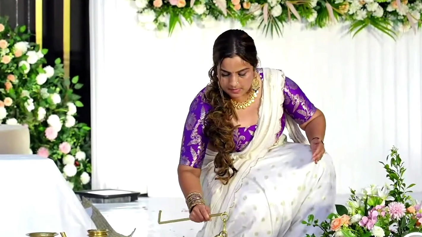 busty Malayali lady in white and violet kerala costume 2