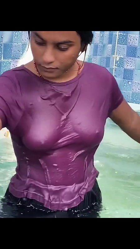 Desi girl in pool wearing transparent tshirt showing wet boobs 2
