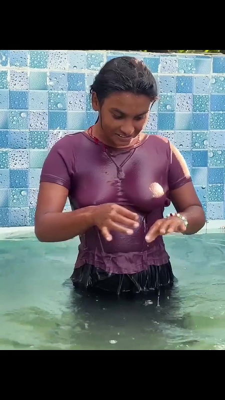 Desi girl in pool wearing transparent tshirt showing wet boobs 2