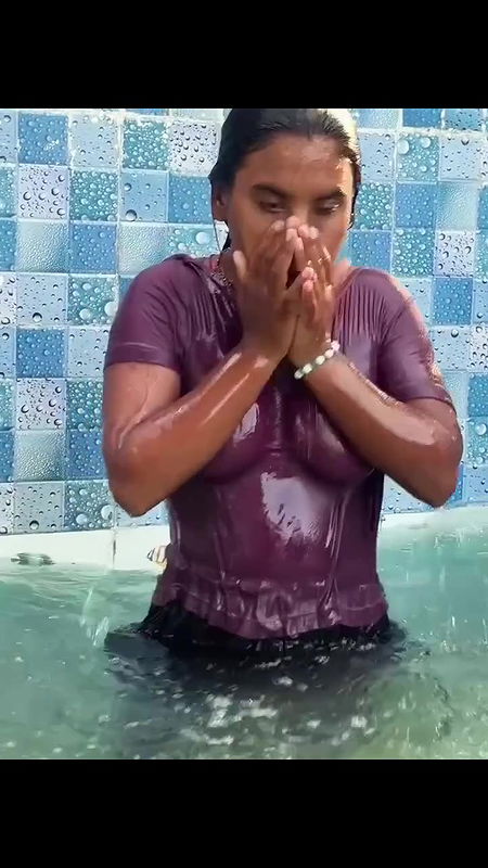 Desi girl in pool wearing transparent tshirt showing wet boobs 2
