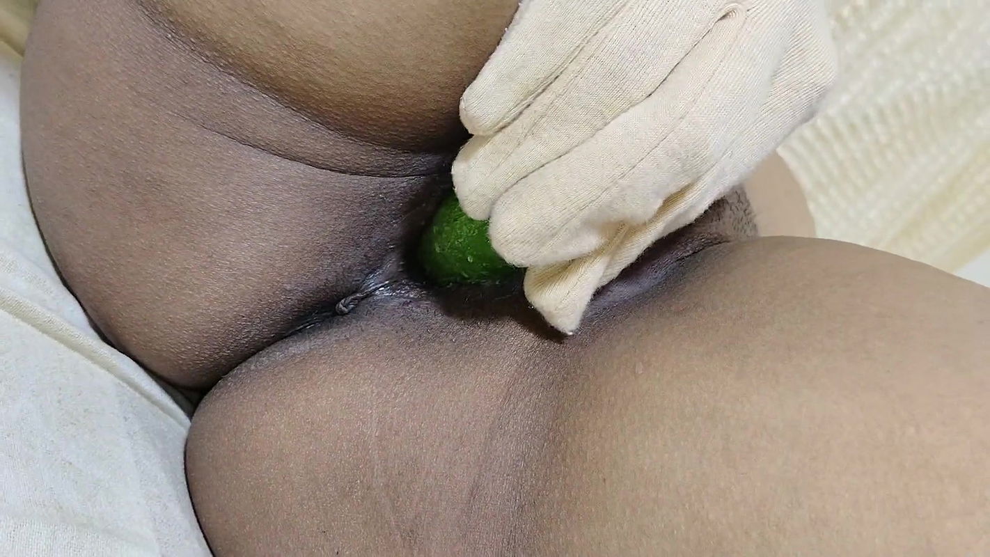A lonely 18-year-old girl fucks a cucumber in her pussy in memory of her boyfriend