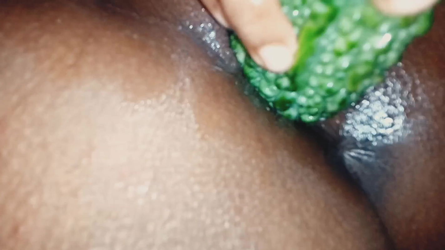 Bangladeshi Bhabhi stuffed a big bitter gourd inside her pussy