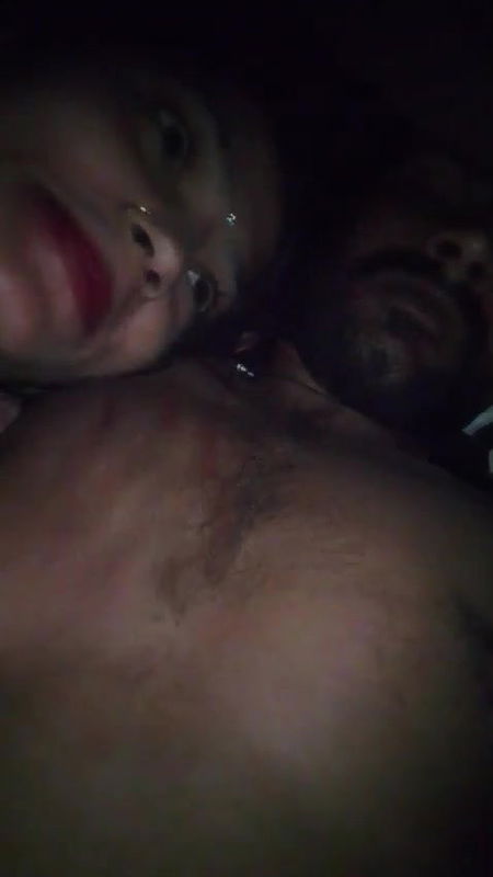 Couple enjoying their time in bed giving blowjob