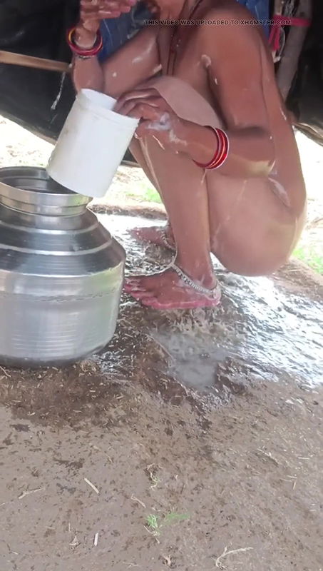 Desi bhabhi outdoor bathing India