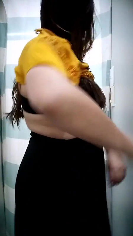 Plump lady big Boobs and cleavage in black bra in trial room