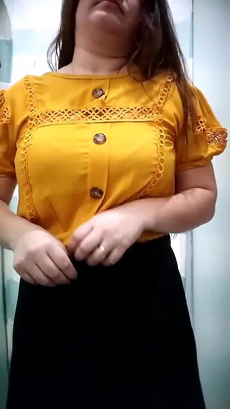 Plump lady big Boobs and cleavage in black bra in trial room