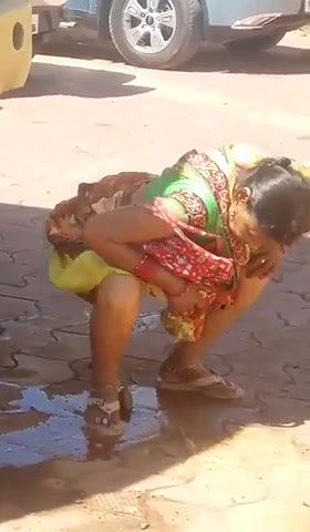 Mature Aunty Pissing Behind The Bus Secretly Recorded