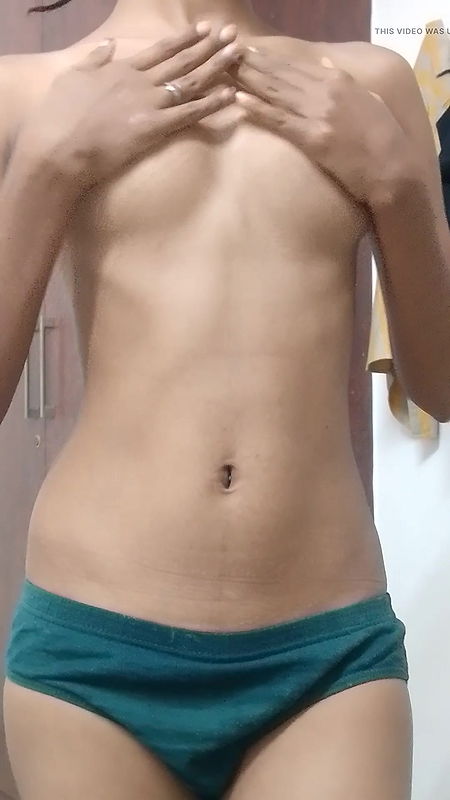 Babe stripping and playing with pussy