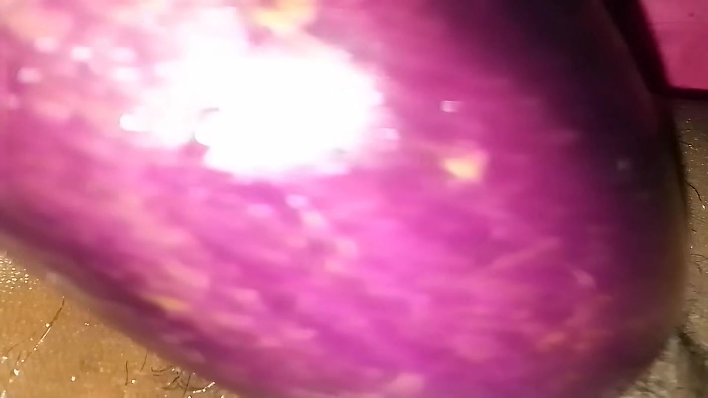 Bangladeshi girl gets excited and fucks her pussy with eggplant