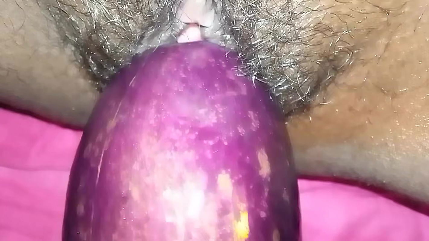 Bangladeshi girl gets excited and fucks her pussy with eggplant