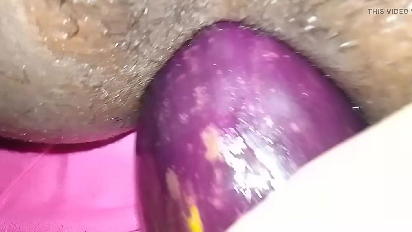 Bangladeshi girl gets excited and fucks her pussy with eggplant