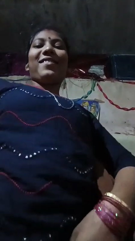 Husband pressing wife boob before sex at home