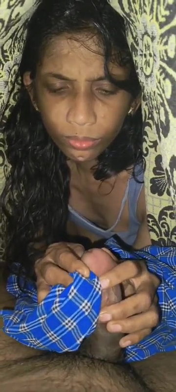 Cute girl giving blowjob to het boyfriend under bed cover