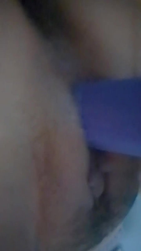 Hot babe inserting dildo