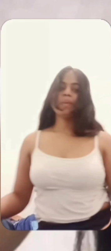 Chubby shy Indian girl showing round boobs to lover