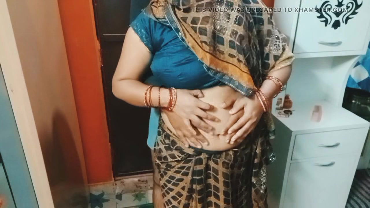 Beautiful Indian bhabhi having romance.