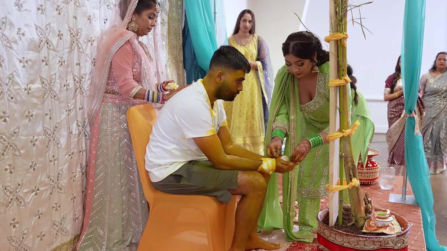 Punjabi Girl sexy cleavage and boobs in green and orange costume