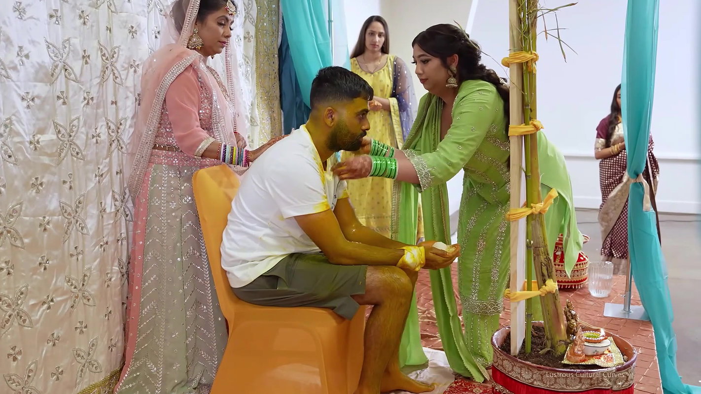 Punjabi Girl sexy cleavage and boobs in green and orange costume