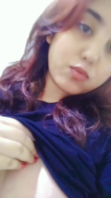 Beautiful babe pressing her boobs