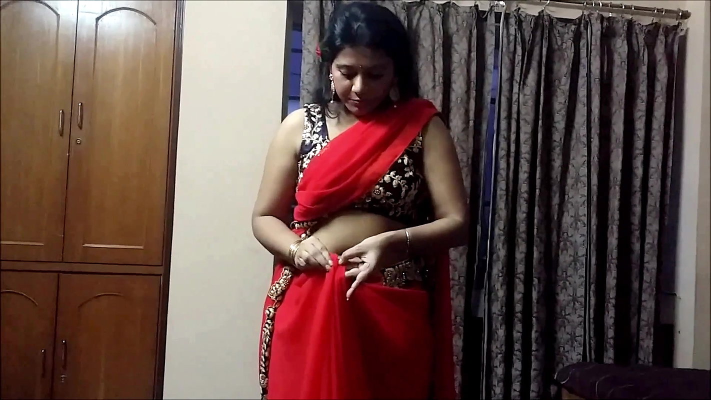 Bengali Lady sexy saree drape in red saree showing pierced fleshy navel 22