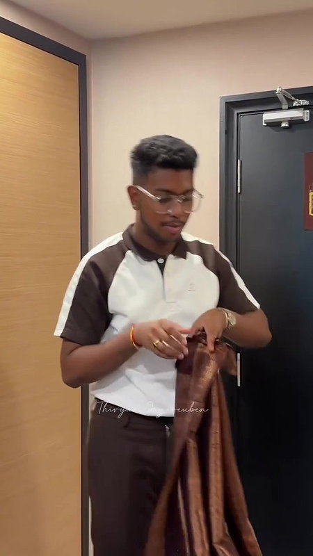 Vijay TV Anchor Priyanka saree wearing by unknown guy 22