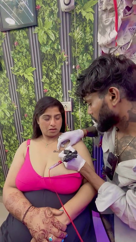 desi lady huge breasts tatooing in pink bra 22