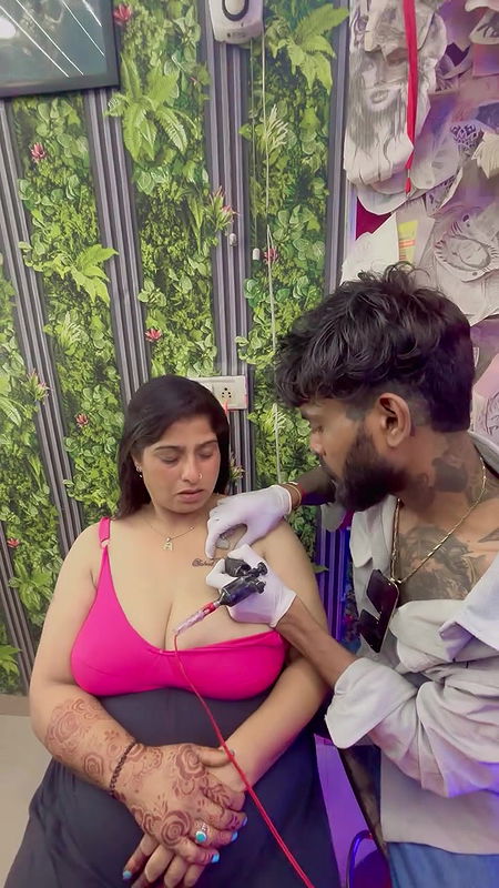 desi lady huge breasts tatooing in pink bra 22