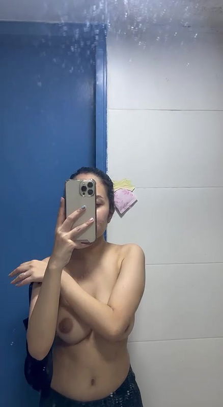 Sexy babe making topless video 22