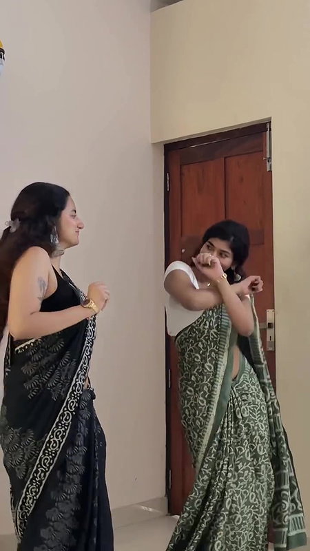 cute malayali girl sexy pierced navel dance in black saree 22
