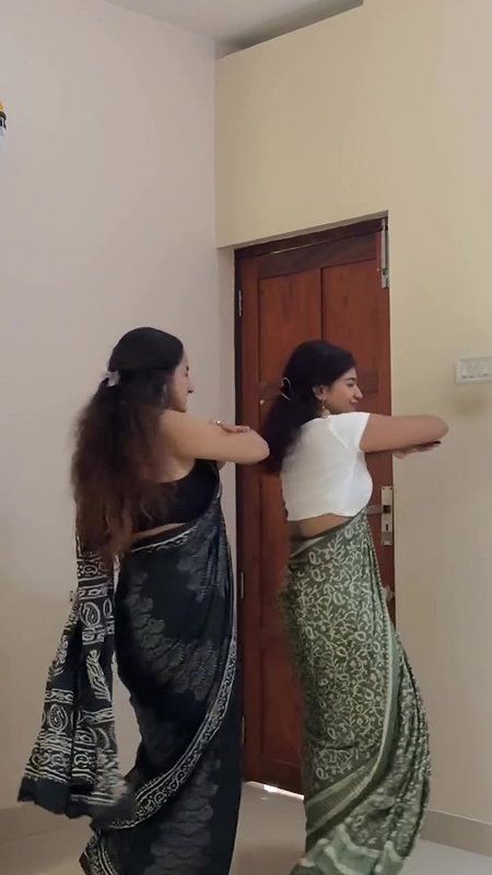 cute malayali girl sexy pierced navel dance in black saree 22