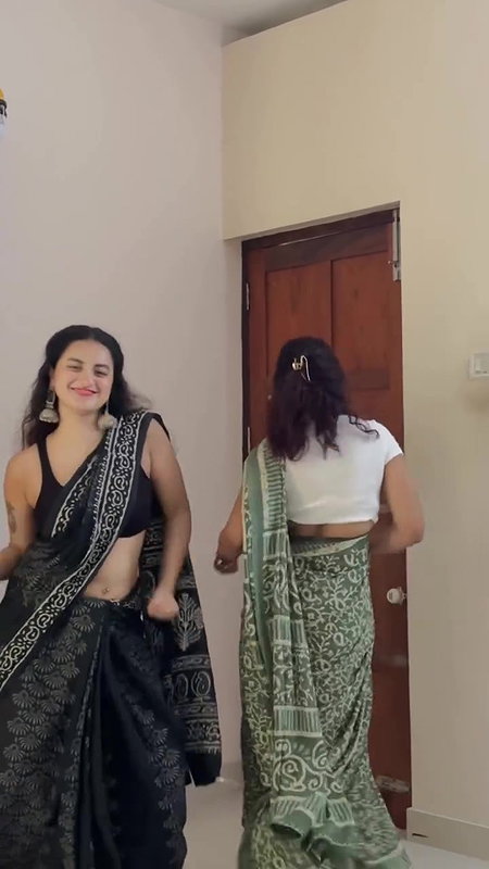 cute malayali girl sexy pierced navel dance in black saree 22