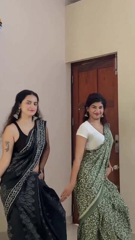 cute malayali girl sexy pierced navel dance in black saree 22