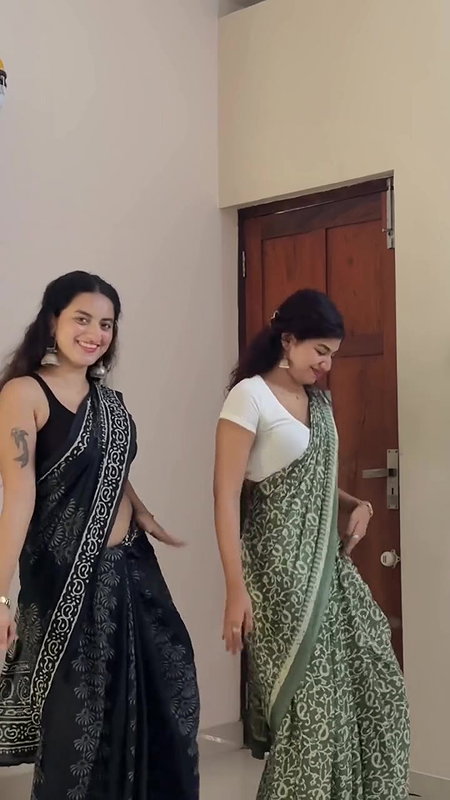 cute malayali girl sexy pierced navel dance in black saree 22