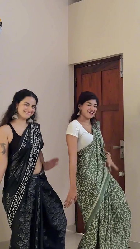 cute malayali girl sexy pierced navel dance in black saree 22