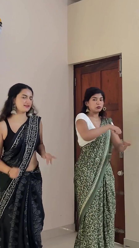 cute malayali girl sexy pierced navel dance in black saree 22