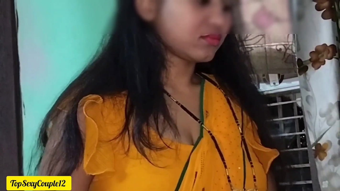 Desi Indian bhabhi in yellow saree looking hot and sexy