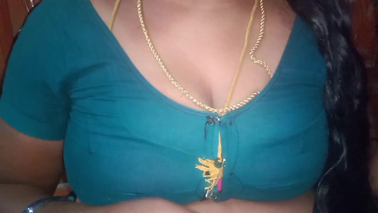 Tamil aunty squeezing her breasts when she is alone and unable to control her emotions.