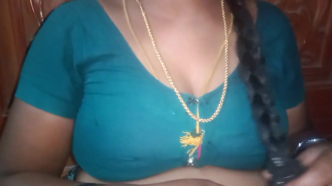 Tamil aunty squeezing her breasts when she is alone and unable to control her emotions.